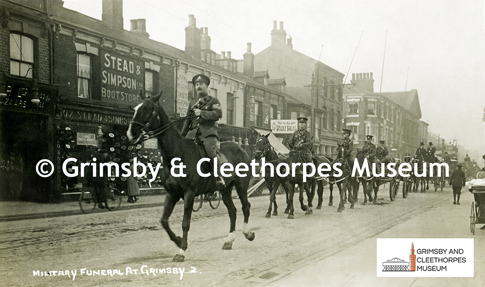 A military funeral procession at Grimsby (looking from Freeman Street Market) c1914